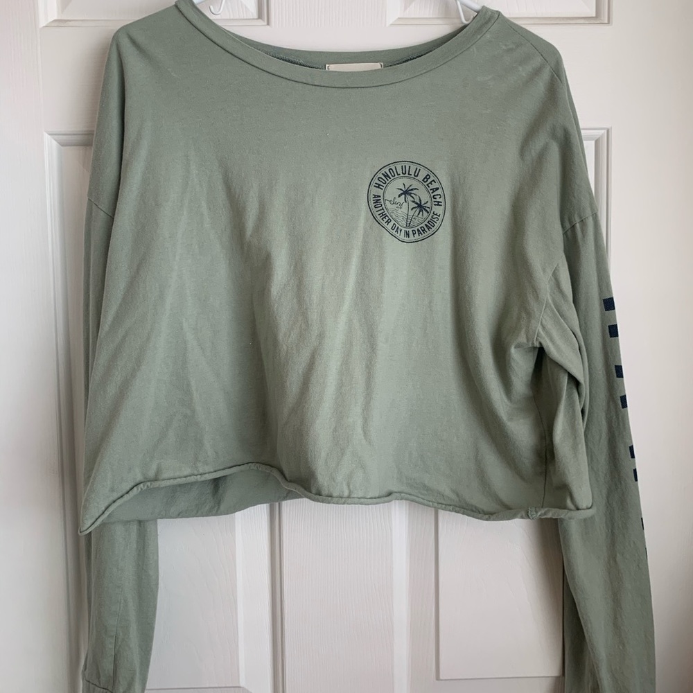 Light green long sleeve cropped with designs